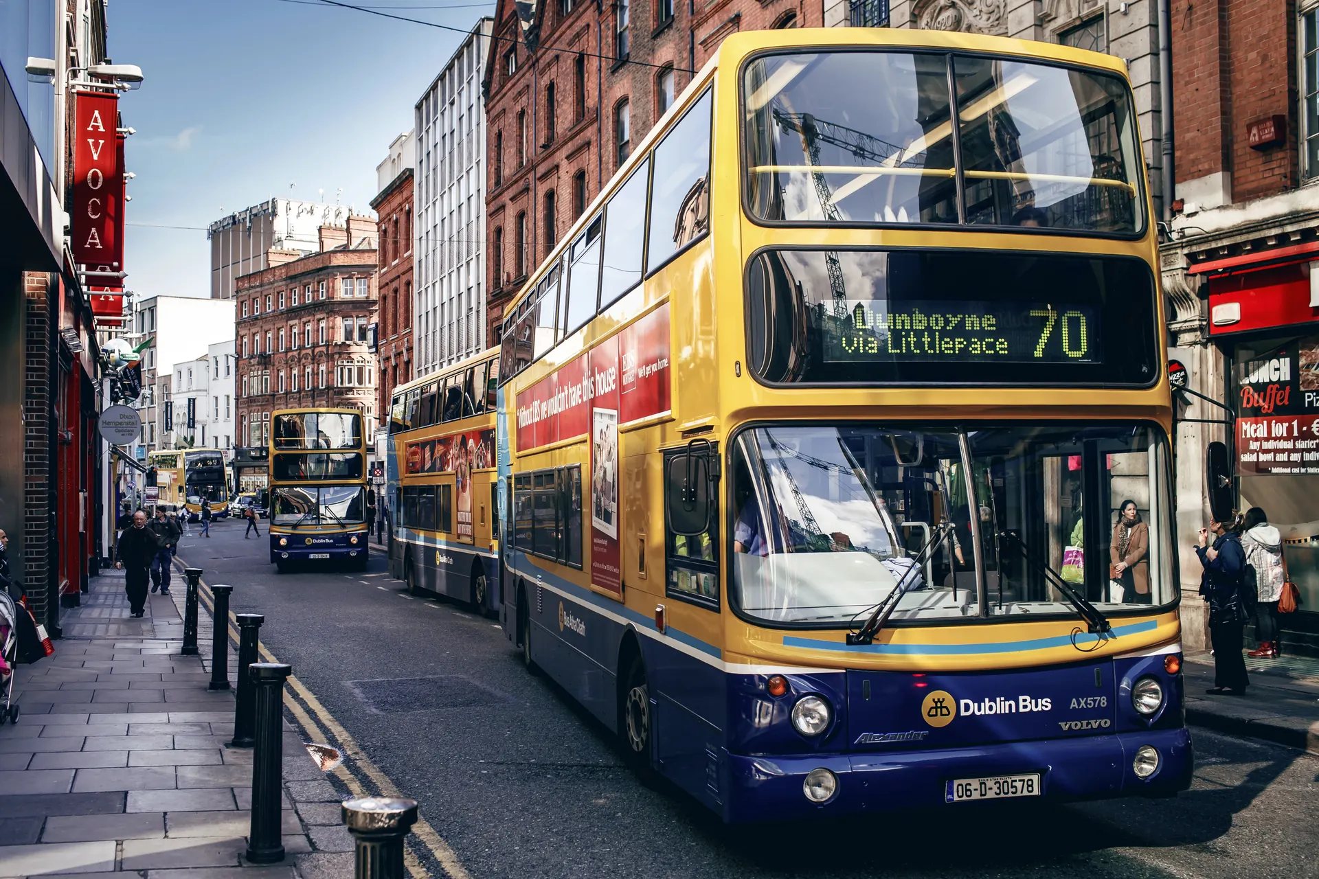 Dublin city centre with its distinctive yellow double-decker buses